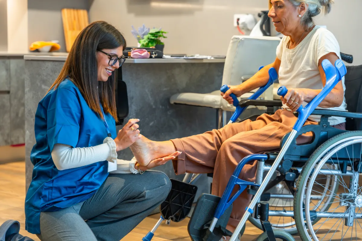 A Mily's caregiver providing gentle personal care to a client at home.